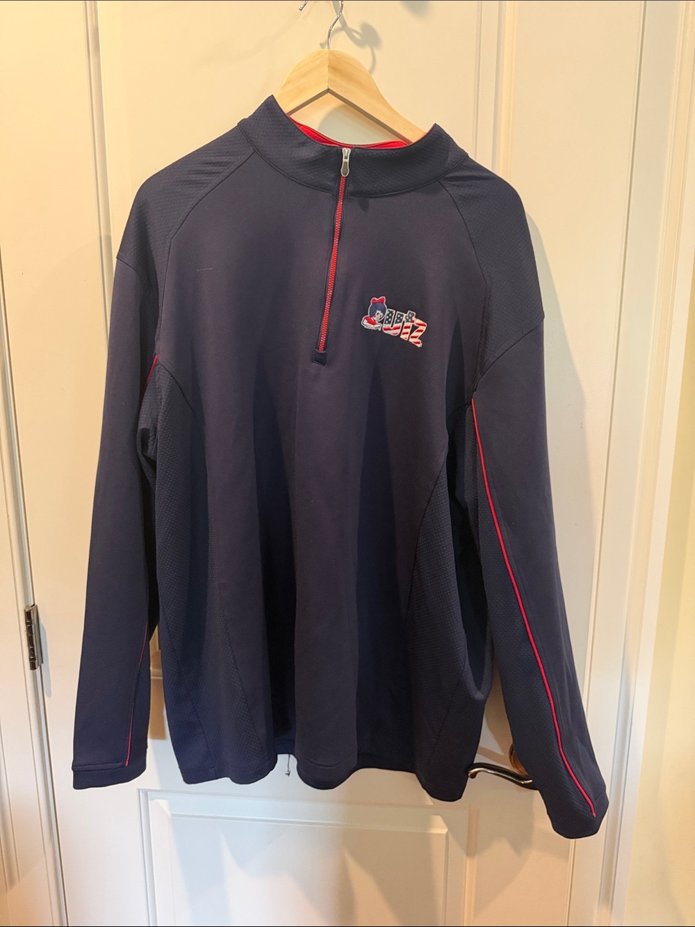 Pebble Beach Navy Half-Zip Pullover with Red Trim and Embroidered Logo